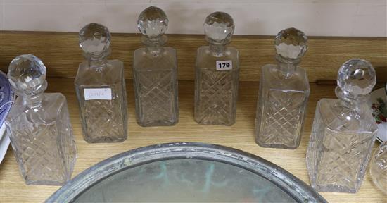 Six cut glass spirit decanters